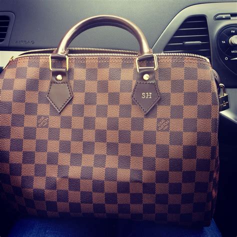 louis vuitton initials|louis vuitton bag with monogram.